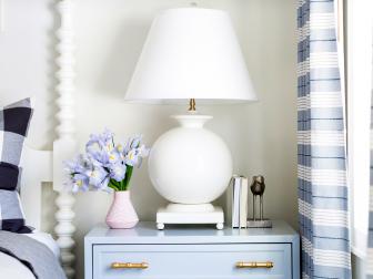 contemporary blue nightstand with brass hardware