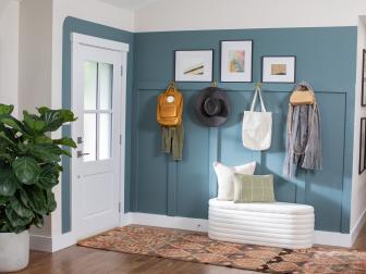 White Entryway With a Blue Paneled Accent Wall